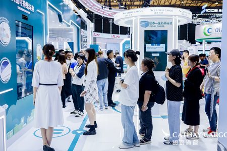 Visitors queueing to take part in the interactive elements at the Cathay Cargo stand