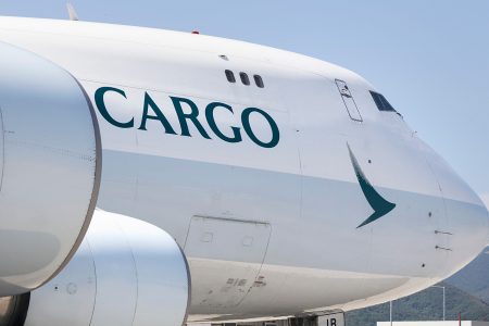 A close-up of the nose of a Cathay cargo plane