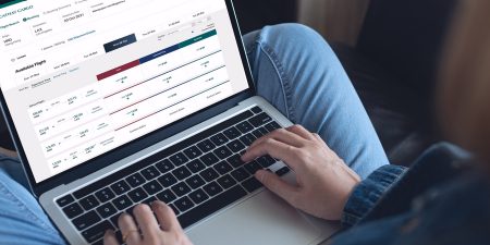 A person researching Cathay Cargo solutions on a computer