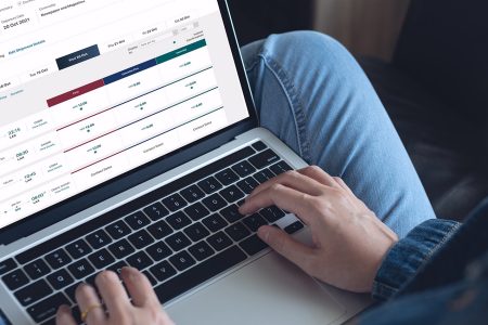 A person researching Cathay Cargo solutions on a computer