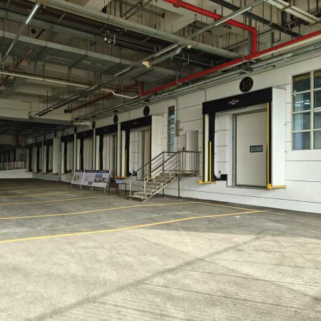 Exterior parking area of a loading bay facility