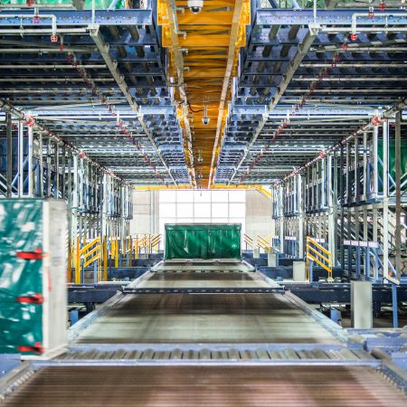 Cathay Cargo Terminal Hong Kong. A large white building with blue sky