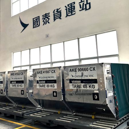 The Cathay Cargo Terminal logo on a wall