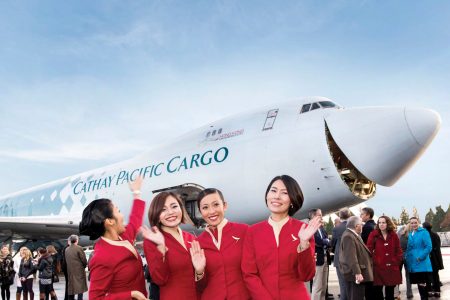 Carbin crew photo in front of Cathay Cargo aircraft