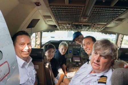 SFO Vanessa Jago in cockpit with visitors