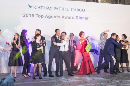 Cathay Cargo staff and customers dancing on stage