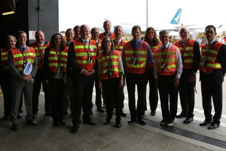 Oregon governor Kate Brown in group photo near tarmac at Cathay Cargo terminal