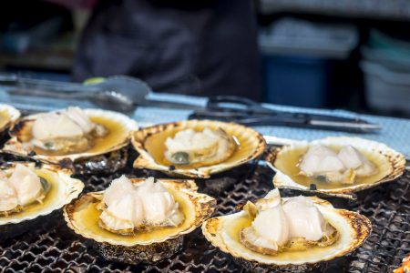 Sea scallops cooked on a grill