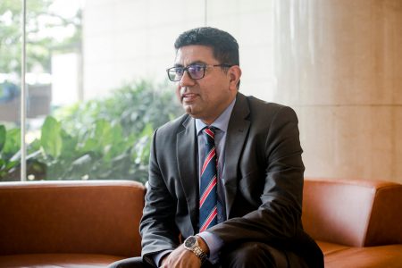 Kapil Madhok, seated on sofa