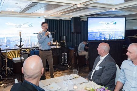 Ronald Lam addressing guests at party