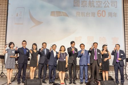 management team toasting on stage