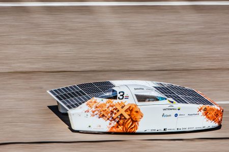 A solar powered race car with Vattenfall team livery on the track