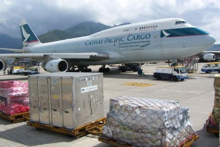 Cathay 747 B-HUS on tarmac with cargo shipments