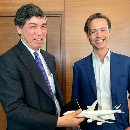 Willy Shih and James Conlin with model Cathay aircraft