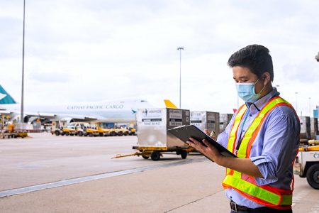 CPSL Staff on tarmac with clipboard