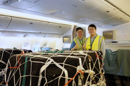 Simon Leung and Alex Leung with thumbs up