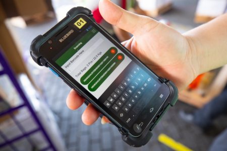 A handheld device used to scan and input package details