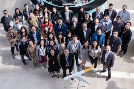 Air Hong Kong team group photo with aircraft model