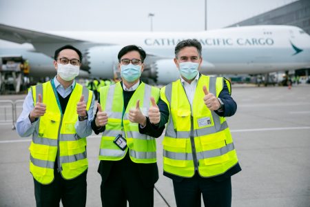 Max Mak, Frosti Lau, Tom Owen posing with thumbs up on tarmac