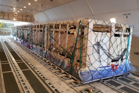live animal crate inside cargo aircraft 