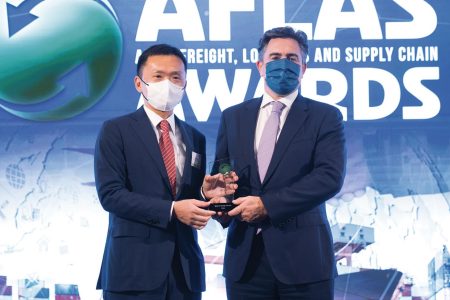 Tom Owen collecting AFLAS award