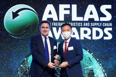Tom Owen receiving award at AFLAS