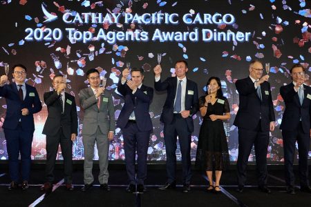 Group photo onstage at Cathay agents award dinner