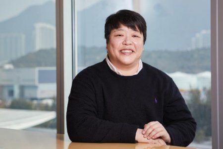 Toby Tse seated at desk