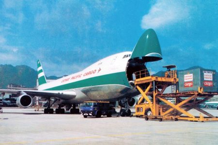 film photograph of Cathay Cargo aircraft with nose door open