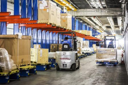 Forklift in cargo terminal