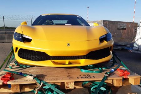 Yellow Ferrari on pallet