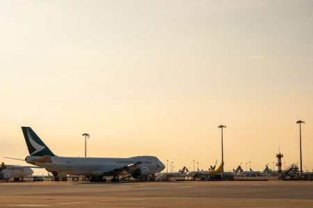 Cathay aircraft on tarmac at dusk