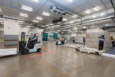 Forklift inside cargo facility