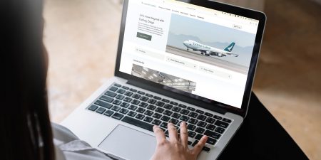 laptop user accessing new Cathay Cargo website