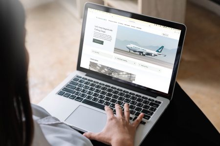laptop user accessing new Cathay Cargo website
