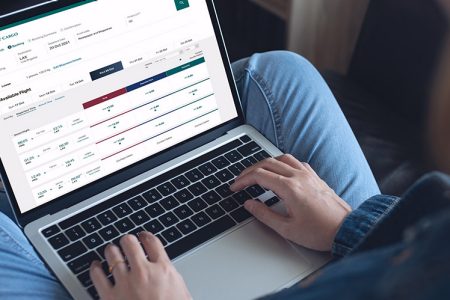 Customer using Cathay Cargo Click & Ship on laptop