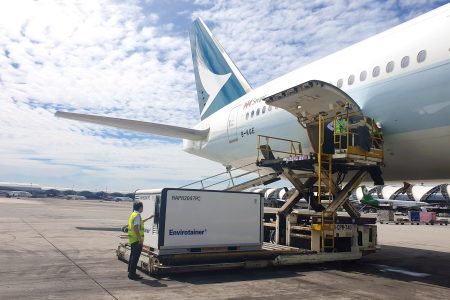 Cathay aircraft on the tarmac being loaded with temperature-controlled cooltainer