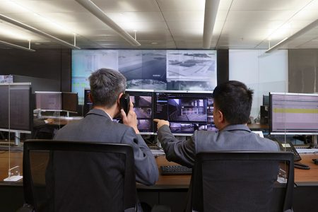 Two staff members at operations control centre