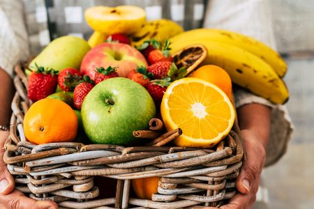 Fruit basket held in hands