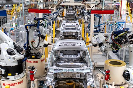 Automobile factory with car frame assembly