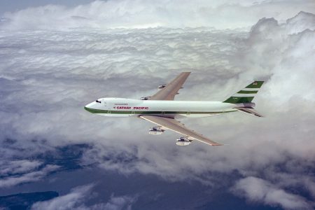 Film photograph of Cathay 747-200 at high altitude with classic stripes livery 