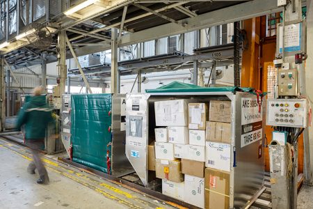 ULD in cargo terminal filled with parcels
