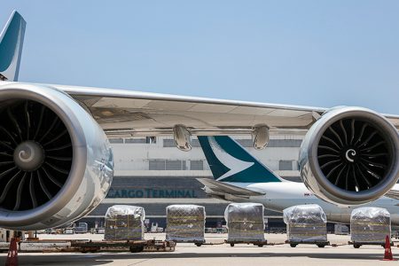 shipments on pallets Cathay Cargo aircraft on tarmac