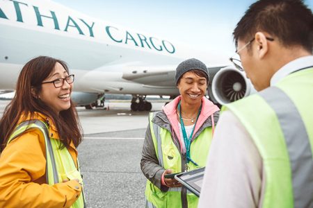 May So and Tammy Liftee on tarmac in Anchorage