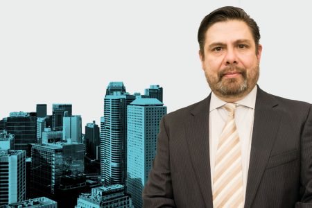 Fernando Dragonné with city skyline collage backdrop