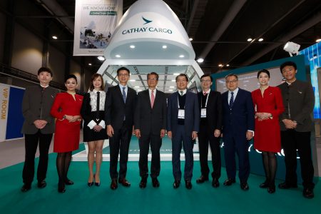 Posing with Cathay Pacific crew