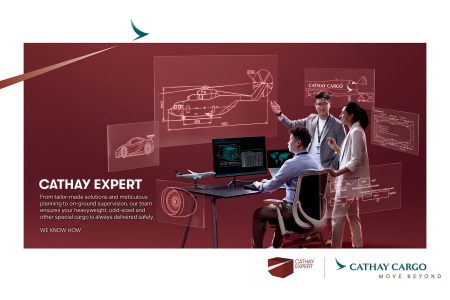 A group of people looking at a computer screen