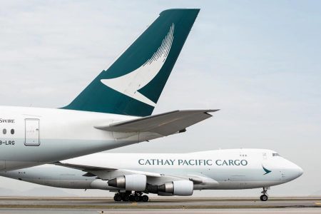 Two Cathay Cargo planes pass by each other