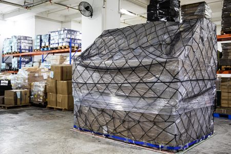 Cathay Cargo Terminal processes around 10 million plastic cargo sheets that keep shipments secure and waterproof in a year