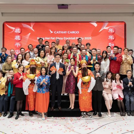 Cathay Cargo managers and invited guests pose for a Lunar New Year photo at the Cathay Cargo Kung Hei Fat Choy party